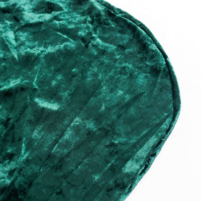 Green velvet fabric with a soft, textured surface