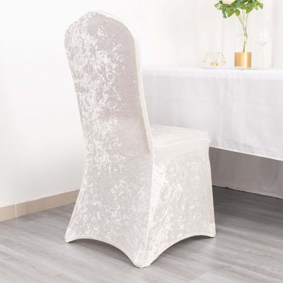 Elegant white chair cover for dining chairs, perfect for events or home decor.