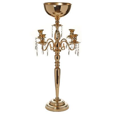 Gold candelabra with three candle holders and decorative crystals.