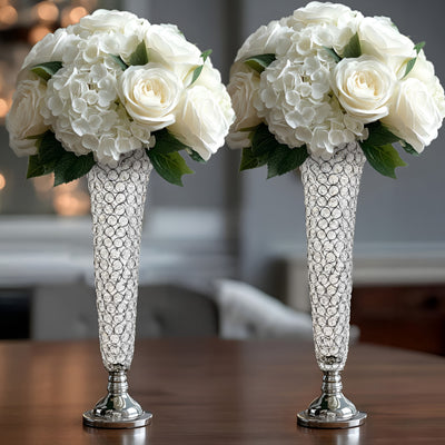 Elegant floral arrangements in crystal vases for sophisticated decor.