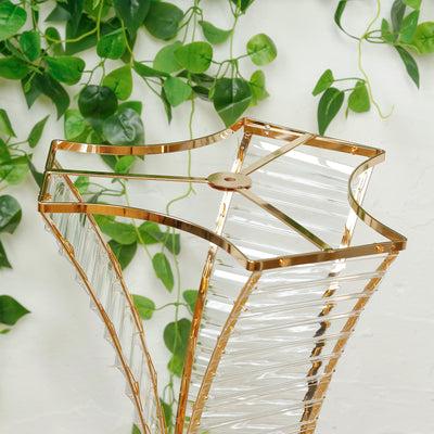 Elegant gold and crystal floor lamp with a unique geometric design.