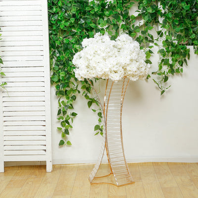 Elegant floral display stand with white flowers and a modern design.