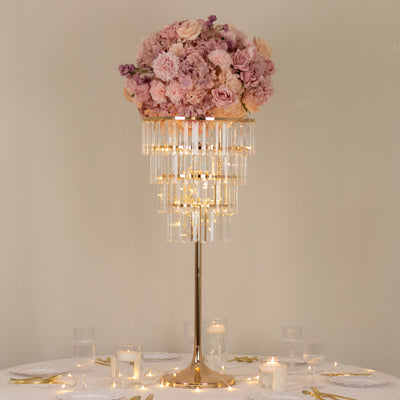 Elegant floral centerpiece with crystal accents and soft lighting.