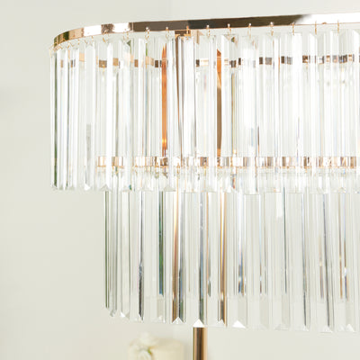 Elegant crystal chandelier with gold accents for stylish home decor.
