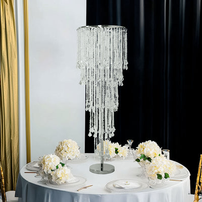 Elegant crystal chandelier centerpiece on a dining table.
