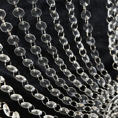 Crystal bead curtain with clear acrylic links on a black background