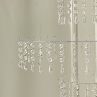 Crystal chandelier with dangling beads and elegant design.