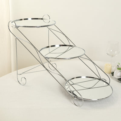 Three-tier chrome serving stand with mirrored plates.
