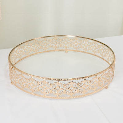 Gold decorative serving tray with intricate cutout design.