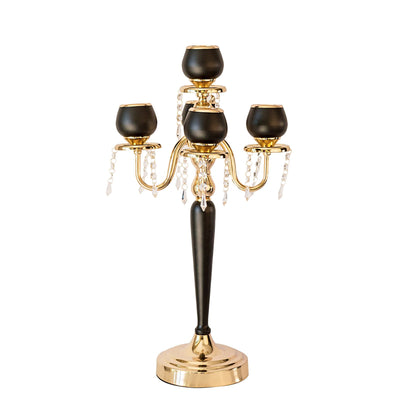 Elegant black and gold candle holder with crystal accents