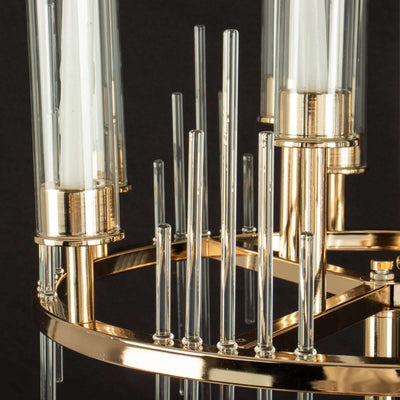 Gold and clear glass chandelier with elegant design elements.