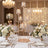 Elegant wedding table centerpiece with crystal candle holders and white floral arrangements