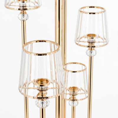 Luxury gold and crystal table lamps with clear acrylic shades, close-up view
