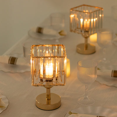 Elegant table lamp with crystal design and warm glowing light.