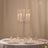 Elegant crystal candelabra centerpiece on a beautifully set dining table.