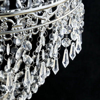 Elegant crystal chandelier with intricate detailing and sparkling drops.