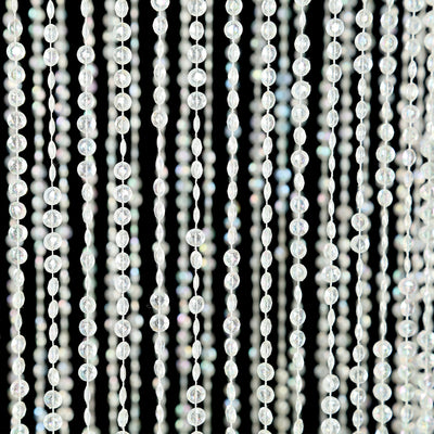 Crystal beaded curtain strands on a black background.