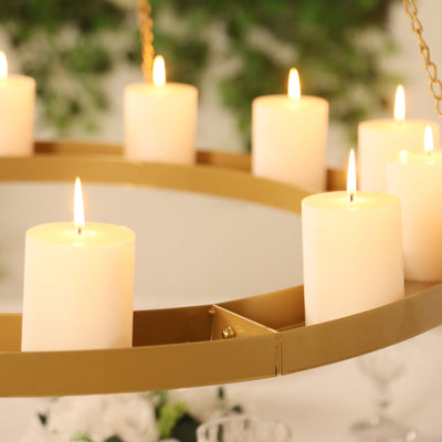 Elegant gold chandelier with glowing candles, perfect for ambiance.