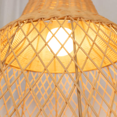 Woven bamboo pendant lamp with warm glowing light