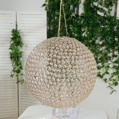 Gold decorative hanging orb light fixture with crystal accents.