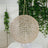 Gold decorative hanging orb light fixture with crystal accents.