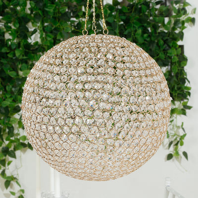 Crystal ball pendant light with gold accents, perfect for elegant decor.