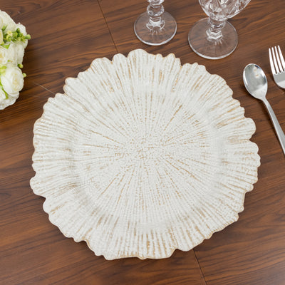 Textured ceramic serving plate with fluted edges on a wooden table.