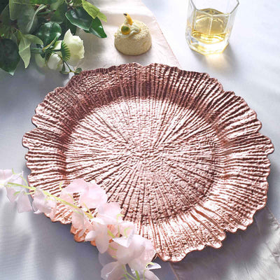 Rose gold textured serving platter with scalloped edges.