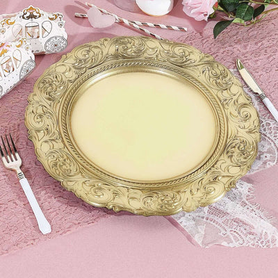 Elegant gold decorative charger plate on pink tablecloth.