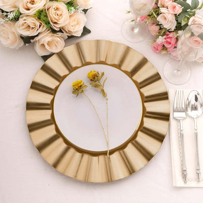 Elegant gold-rimmed plate with flowers, set on a beautifully arranged table.