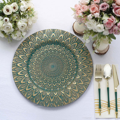Decorative teal and gold mandala plate on a table setting with flowers and cutlery.