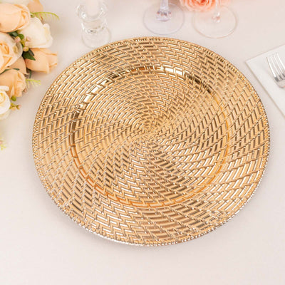 Elegant gold decorative plate with intricate spiral design.