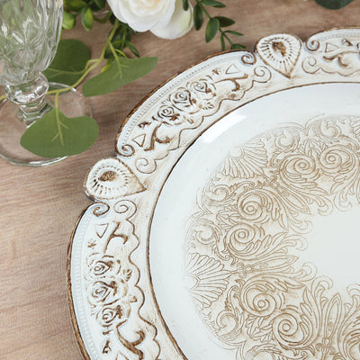 Decorative vintage plate with intricate floral design and ornate edges.