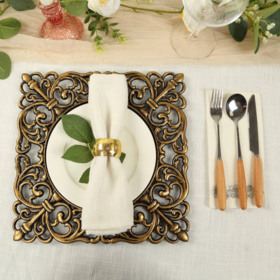 Elegant decorative plate with napkin and cutlery on a table setting.