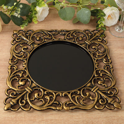 Decorative ornate black mirror with gold frame, perfect for home decor.