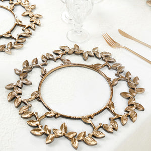 Elegant gold leaf design charger plate on a dining table.