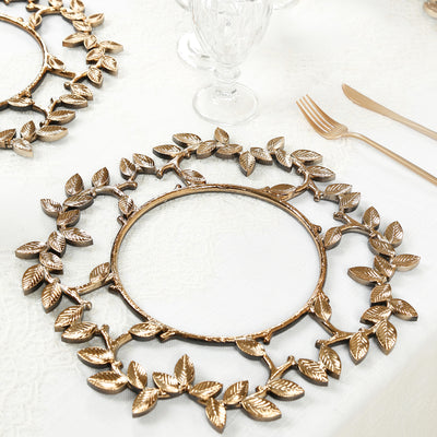 Elegant gold leaf design charger plate on a dining table.