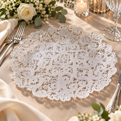 Elegant silver beaded lace placemat on a formal dining table