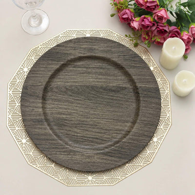 Elegant round wood charger plate with gold geometric edge on a table setting