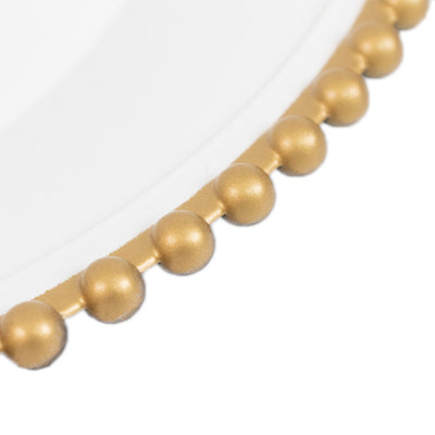 Gold bead trim on a white plate edge