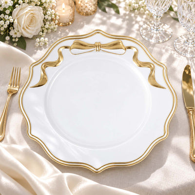 Elegant white and gold luxury dinner plate on a formal table setting