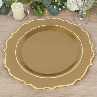 Gold charger plate with elegant scalloped edges on a wooden table.
