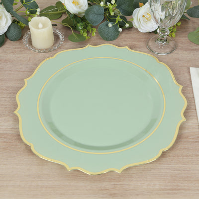 Mint green decorative plate with gold rim on a wooden table.