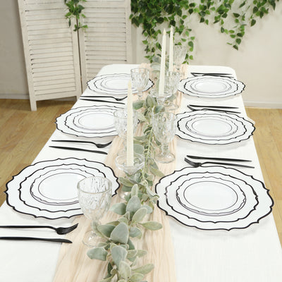 Elegant black and white dinnerware set on a beautifully styled dining table.