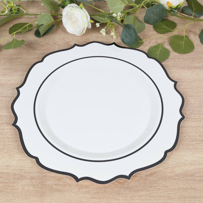 Elegant white plate with black trim on wooden surface.