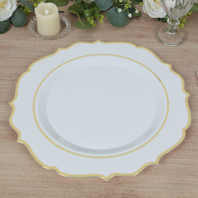 White plate with gold trim on a wooden table backdrop.