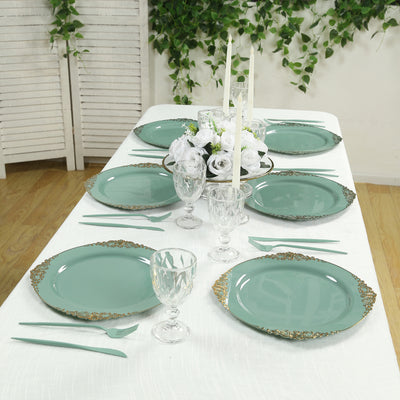 Elegant teal dinner plates set on a beautifully decorated table for a special occasion.