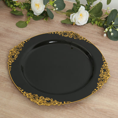 Black decorative plate with gold ornate edge design