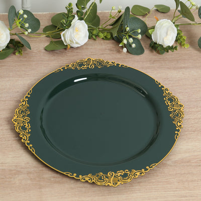 Elegant green plate with gold ornate trim on a wooden surface.