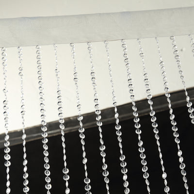 Crystal bead curtain strands hanging elegantly.